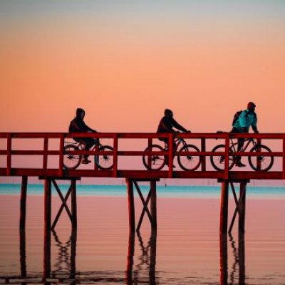 Four cyclists getting outside for sunrise at the Trapiche in Pelotas, Brazil